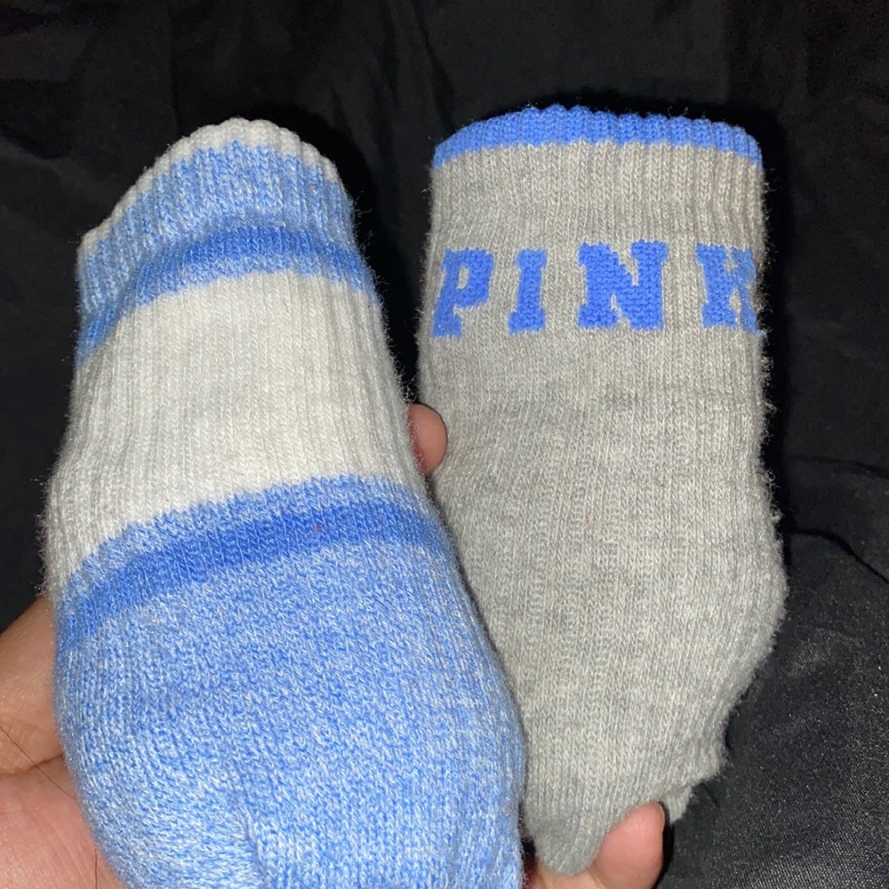 name brand pink socks , worn twice! Washed & dried .